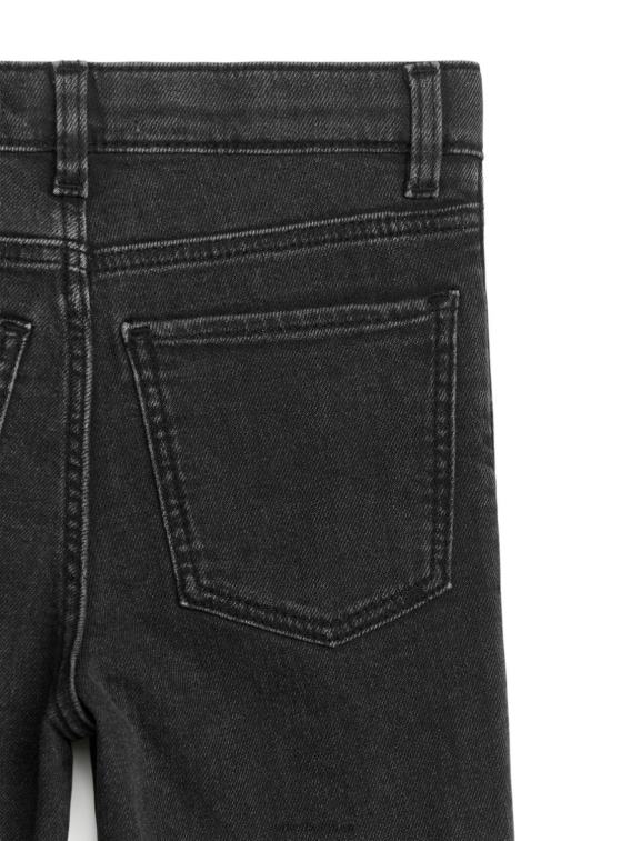 ARKET kleding 0DXJP1572 zwart gewassen uitlopende stretchjeans kinderen